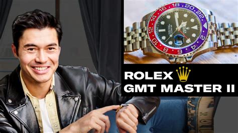 Henry Golding Shows Off His Watch Collection (Rolex, Cartier, .